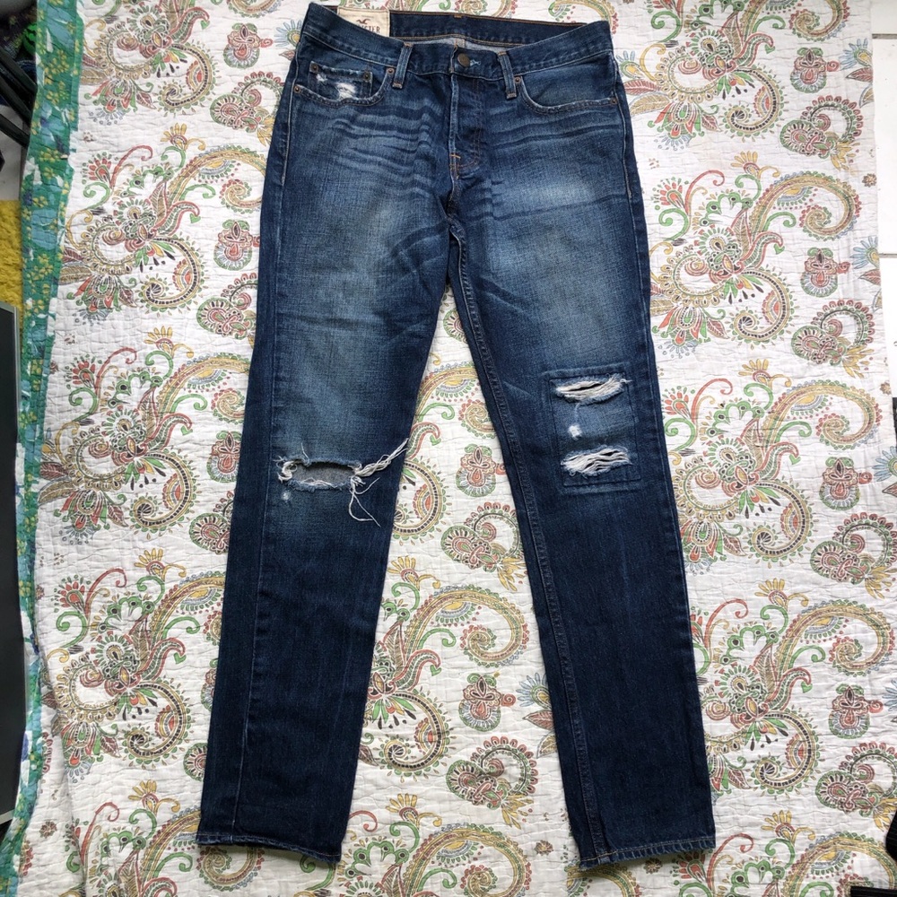 Dark wash distressed denim straight leg jeans